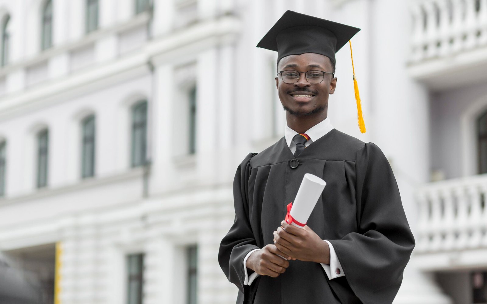 black male-shot-smiley-graduate-student